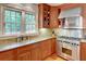 Gourmet kitchen with stainless steel appliances, and granite countertops at 3115 Peachtree Ne Dr, Atlanta, GA 30305