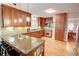 Stylish kitchen with stainless steel appliances, granite counters, and hardwood floors at 3115 Peachtree Ne Dr, Atlanta, GA 30305