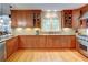 Spacious kitchen with stainless steel appliances, granite countertops, and hardwood floors at 3115 Peachtree Ne Dr, Atlanta, GA 30305