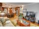 Bright living room with hardwood floors, comfortable seating, and a modern entertainment center at 3115 Peachtree Ne Dr, Atlanta, GA 30305