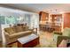 Open-concept living area connecting to a spacious kitchen and dining area, perfect for entertaining at 3115 Peachtree Ne Dr, Atlanta, GA 30305