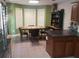A kitchen with stainless steel appliances, dark countertops, oak cabinets and tile flooring at 143 Delane Dr, Dallas, GA 30157