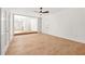 Spacious living room with wood floors, white walls, and natural light at 230 Deer Forest Rd, Fayetteville, GA 30214