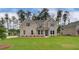 Charming two-story brick home with manicured lawn and a welcoming front entrance at 322 Delta Dr, Mcdonough, GA 30253