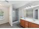 Modern bathroom featuring double sinks, a walk-in shower, and a soaking tub for a spa-like experience at 6071 Apple Grove Rd, Buford, GA 30519