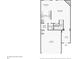 Detailed floor plan of the first floor showcasing the layout of the kitchen, living room, and garage at 6071 Apple Grove Rd, Buford, GA 30519