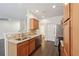 Kitchen featuring granite countertops, stainless steel appliances, and hardwood floors at 6071 Apple Grove Rd, Buford, GA 30519