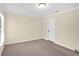 Bedroom featuring neutral paint, neutral carpet, trimmed in white, and one window at 84 Mount Vernon Cir, Atlanta, GA 30338