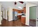 The spacious kitchen has stainless steel appliances and hardwood flooring at 84 Mount Vernon Cir, Atlanta, GA 30338