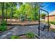 A swing set, playground equipment, and a gravel area provide a fun space for outdoor activities at 84 Mount Vernon Cir, Atlanta, GA 30338