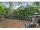 Backyard featuring a brick patio with outdoor seating and a charming water fountain at 908 N Highland Ne Ave, Atlanta, GA 30306
