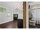 Open-concept view of bathroom with marble floors and elegant fixtures at 908 N Highland Ne Ave, Atlanta, GA 30306