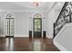 Grand foyer featuring rich hardwood floors, decorative doors, and elegant trim, creating a welcoming entrance at 908 N Highland Ne Ave, Atlanta, GA 30306