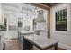 Open concept kitchen with a large island, stainless steel appliances, and plenty of natural light at 908 N Highland Ne Ave, Atlanta, GA 30306