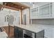 Gourmet kitchen with stainless steel appliances and a center island with marble countertops at 908 N Highland Ne Ave, Atlanta, GA 30306