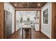 Stunning kitchen features custom wood ceiling and beams, along with stainless steel appliances and white cabinetry at 908 N Highland Ne Ave, Atlanta, GA 30306