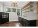 Wet bar featuring a stylish countertop and plenty of storage at 908 N Highland Ne Ave, Atlanta, GA 30306