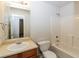 Bathroom with single sink vanity, toilet, and shower/tub combo at 137 Legend Creek Dr, Canton, GA 30114
