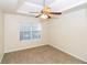 Inviting bedroom with neutral paint, new carpet, and a ceiling fan at 137 Legend Creek Dr, Canton, GA 30114