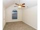 Inviting bedroom with vaulted ceilings and a ceiling fan, providing a cozy atmosphere with natural light at 137 Legend Creek Dr, Canton, GA 30114