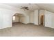 Large bonus room boasts carpeting, ceiling fan, and multiple entrances at 137 Legend Creek Dr, Canton, GA 30114