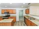 Stylish kitchen with stainless steel appliances, granite counters and an island at 137 Legend Creek Dr, Canton, GA 30114
