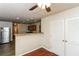 Bright kitchen adjacent to dining area with wood floors and stainless appliances at 137 Legend Creek Dr, Canton, GA 30114