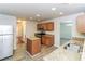 Bright kitchen featuring stainless steel appliances, granite countertops, and wood cabinets at 137 Legend Creek Dr, Canton, GA 30114