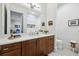 Elegant bathroom features a spacious vanity, modern fixtures, and serene ambiance at 214 Vickery Falls Dr, Roswell, GA 30075