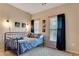Cozy bedroom with carpet, featuring a full bed, and an abundance of natural light from two windows at 5437 Blossom Brook Dr, Sugar Hill, GA 30518