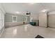 Large basement area with plenty of space, ceiling fan, and bright lighting at 1190 Hess Dr, Avondale Estates, GA 30002