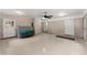 Spacious basement with neutral flooring and brick accent wall at 1190 Hess Dr, Avondale Estates, GA 30002