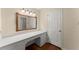 A well-lit vanity with a large mirror and ample countertop space at 1190 Hess Dr, Avondale Estates, GA 30002