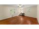 Bright bedroom with hardwood floors, natural light, ceiling fan and neutral walls at 1190 Hess Dr, Avondale Estates, GA 30002