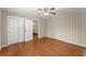 Bedroom featuring hardwood floors, neutral walls and closet space at 1190 Hess Dr, Avondale Estates, GA 30002