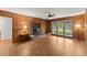 Inviting living room with wood paneling and a brick fireplace at 1190 Hess Dr, Avondale Estates, GA 30002