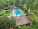 Aerial view of community pool and recreation area surrounded by trees at 1190 Hess Dr, Avondale Estates, GA 30002