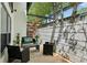 Relaxing back patio with outdoor seating and privacy fence, perfect for entertaining at 195 Arizona Ne Ave # 104, Atlanta, GA 30307