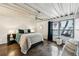 Cozy bedroom with a large window, comfortable bed, and stylish decor, bathed in natural light at 195 Arizona Ne Ave # 104, Atlanta, GA 30307