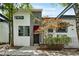 Modern two-story home with a gray and white facade, landscaped yard, and tree with orange leaves at 195 Arizona Ne Ave # 104, Atlanta, GA 30307
