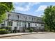 Exterior of Arizona Lofts with modern architectural details, signage, and shaded walkways at 195 Arizona Ne Ave # 104, Atlanta, GA 30307
