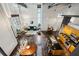 Aerial view showcasing the open-concept living space, kitchen, and dining area with modern industrial design at 195 Arizona Ne Ave # 104, Atlanta, GA 30307