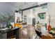 Open-concept living space with high ceilings, modern decor, and sleek furnishings at 195 Arizona Ne Ave # 104, Atlanta, GA 30307