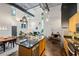 Open-concept living and kitchen area with high ceilings and modern finishes, great for entertaining at 195 Arizona Ne Ave # 104, Atlanta, GA 30307