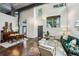 Spacious living area with high ceilings, comfortable seating, and ample natural light from large windows at 195 Arizona Ne Ave # 104, Atlanta, GA 30307
