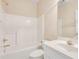 A full bathroom that features a shower, toilet, bathtub and sink at 2417 Saint Feagin Pl, Powder Springs, GA 30127