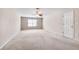 Expansive bedroom featuring neutral walls, carpet, natural light, and a closet at 2417 Saint Feagin Pl, Powder Springs, GA 30127