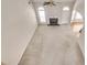 Spacious living room with high ceilings, fireplace, and abundant natural light at 2417 Saint Feagin Pl, Powder Springs, GA 30127