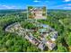 Aerial view of property showcasing neighborhood and community pool at 525 Roland Manor Dr, Dacula, GA 30019
