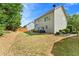 Large backyard featuring green grass and a patio at 525 Roland Manor Dr, Dacula, GA 30019